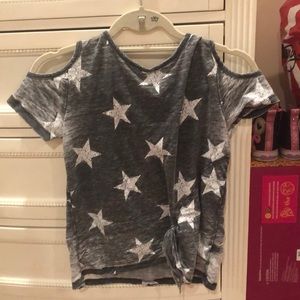 A shirt with a star pattern for females.
